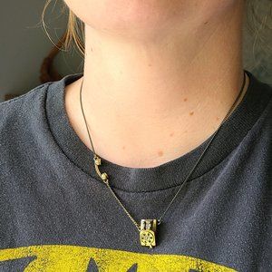 Gold-tone Fossil rotary phone necklace w/glitz